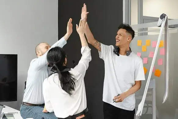 Developers collaborating on Shopify store migration